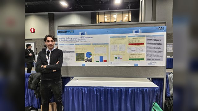 Giovanni Albano standing beside a poster on the energy impact of vehicle automation at TRB 2025